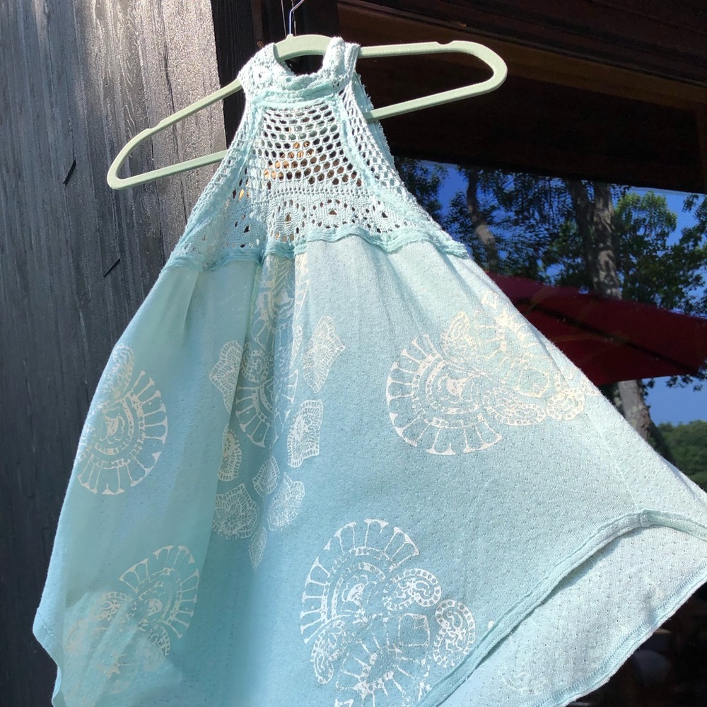 SOLD.   Absolutely stunning crochet detailing FREE PEOPLE tank
